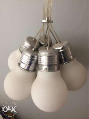 White chanderlier with 7 CFL bulbs