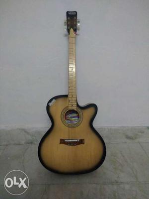 Yellow And Black Acoustic Guitar