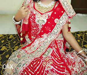 1 year old, red color lehenga, purchased at