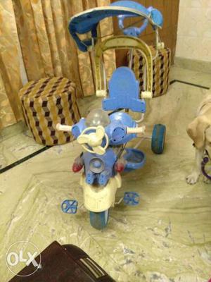 Baby's Blue And White Tricycle