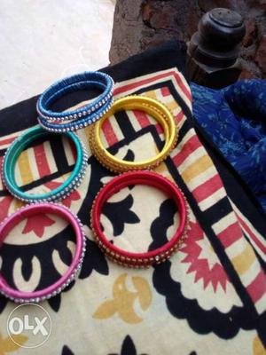 Blue Yellow Red And Pink Bracelets