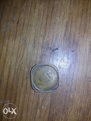 It's George 6 king emperor half Anna coin