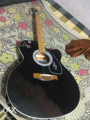 New guitar with cover in excellent condition