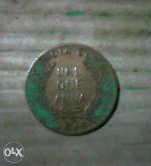 One Anna coin in, antique piece.