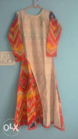 Orange And off white Long Sleeve kurti Completely new and