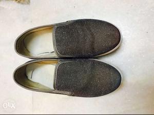 Pair Of Black Slip On Shoes