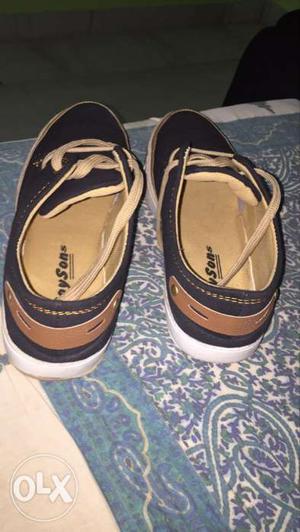 Pair Of Black-and-brown Boat Shoes