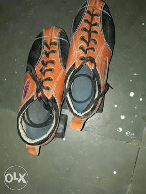 Pair Of Orange-and-black Low Top Sneakers