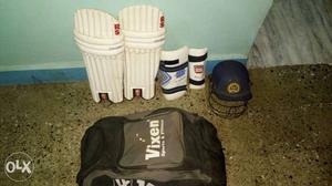 Protos bat, bat pad, thigh pad, hand pad, helmet, kit bag.
