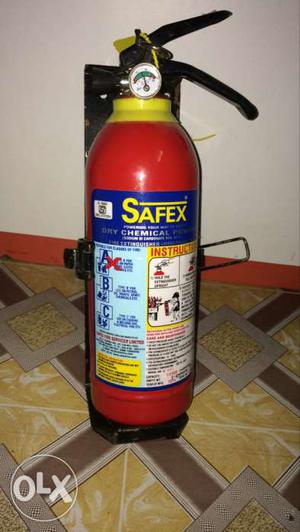 Red, Yellow And Black Safex Fire Extinguisher