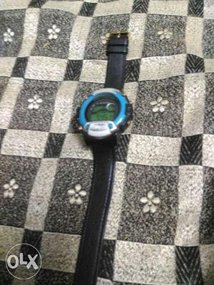Round Blue-faced Digital Watch With Black Leather Strap