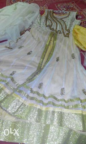 White and golden anarkali suit no used
