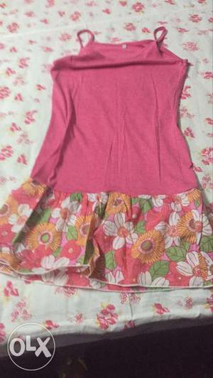 A pretty pink colour dress for a young girl