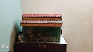 Brown And Red Wooden Framed Fish Tank