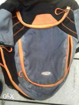 Gray, Black, And Orange Backpack