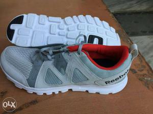 Pair Of Men's Gray-and-white Reebok Low-top Running Shoes
