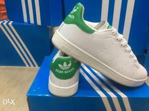 Pair Of White Adidas Stan Smith Sneakers On Box