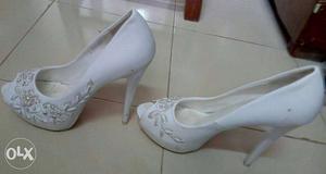 Pair Of White Leather Peep Toe Stilettos