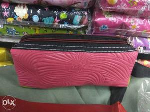 Pink And Black Pouch double zip. 1 piece at 20. If taken