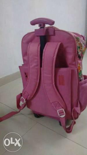 Pink trolly bag for kids. Good condition..three