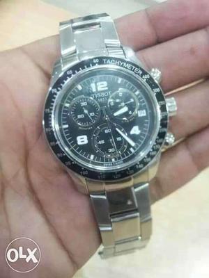 Round Black Tissot Chronograph Watch With Silver Link