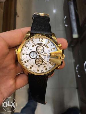 Round Gold Chronograph Watch With Black Leather Band