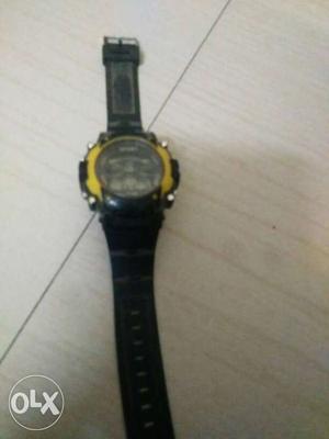 Round Yellow And Black Digital Watch With Black Rubber Strap