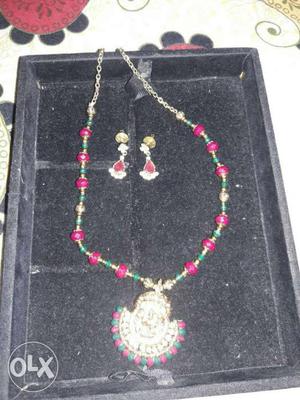 Silver And Pink Pendant Necklace