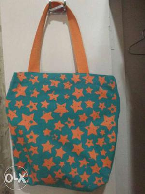 Teal And Orange Star Print Tote Bag