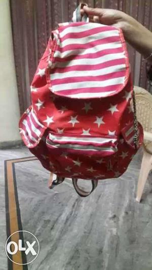 White, Pink And Red Backpack