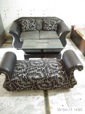 2 seater sofa. Center table and matching couch.