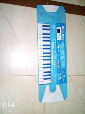Blue Electronic Keyboard