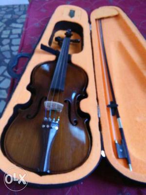 Brown Violin With Bow In Hard Case