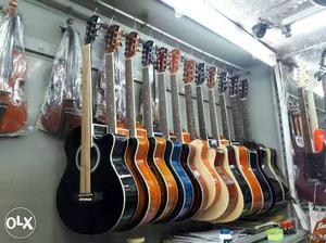 Guitars For Sale with three years warranty.
