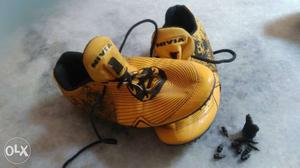 Pair Of Black-and-yellow Nivia Soccer Cleats