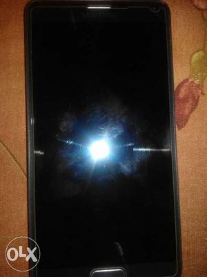 Samsung Note 4 32 GB 1 year old. Excellent