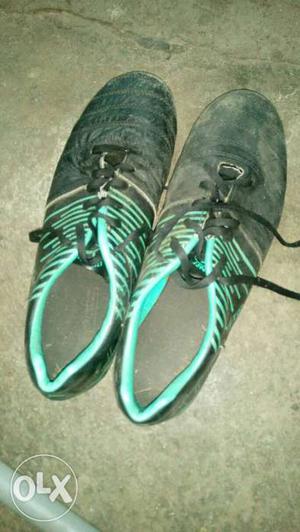 Pair Of Black-and-teal Soccer Cleats