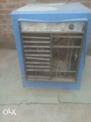 Black And Blue Outdoor AC Condenser Unit