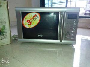 Gray And Black Microwave Oven