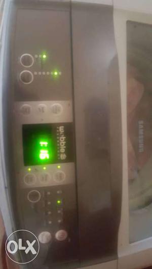 Gray And White Samsung Top Load Clothes Washer