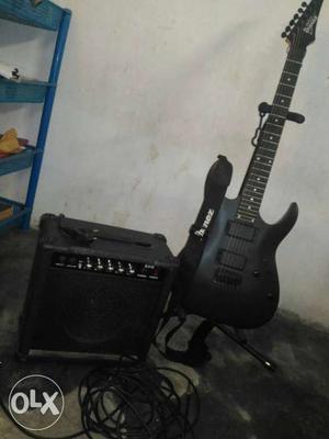 Included microphone,guitar stand, amp, 2