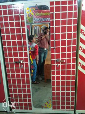 Red And White Wardrobe With Mirror