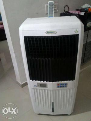 Symphony Portable Air Cooler with remote control and timer.