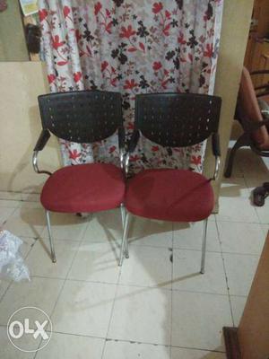Two Black-and-red Padded Chairs