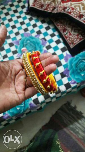 Yellow and red designer bangles