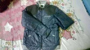 Branded jacket. Very warm. Party wear. Price negotiable.