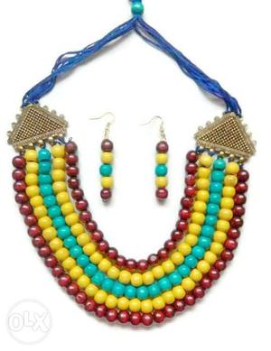 Brown, Yellow, And Teal Beaded Pendant Chandelier Necklace,