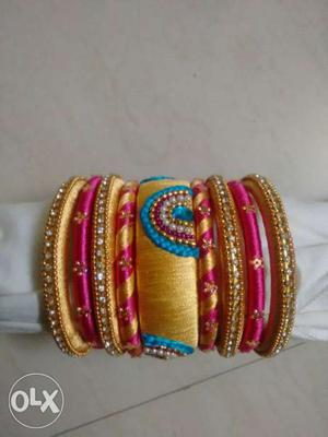 Gold And Pink Bracelets