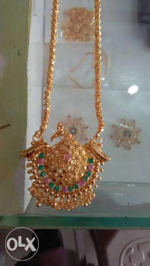 Gold Bird Pendant With Gold Necklace