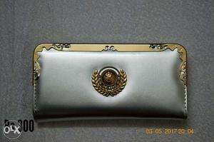Gray clutch with golden touch